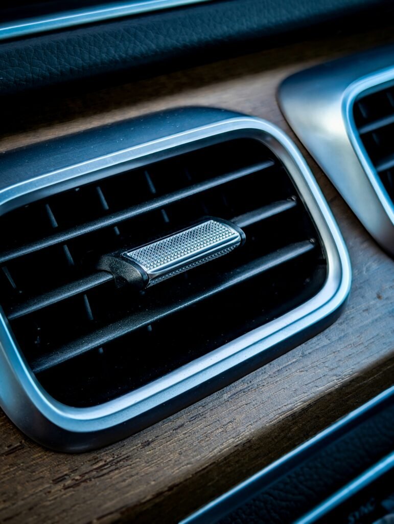 Close-up of a car dashboard air vent, illustrating car AC repair in Plantation, FL