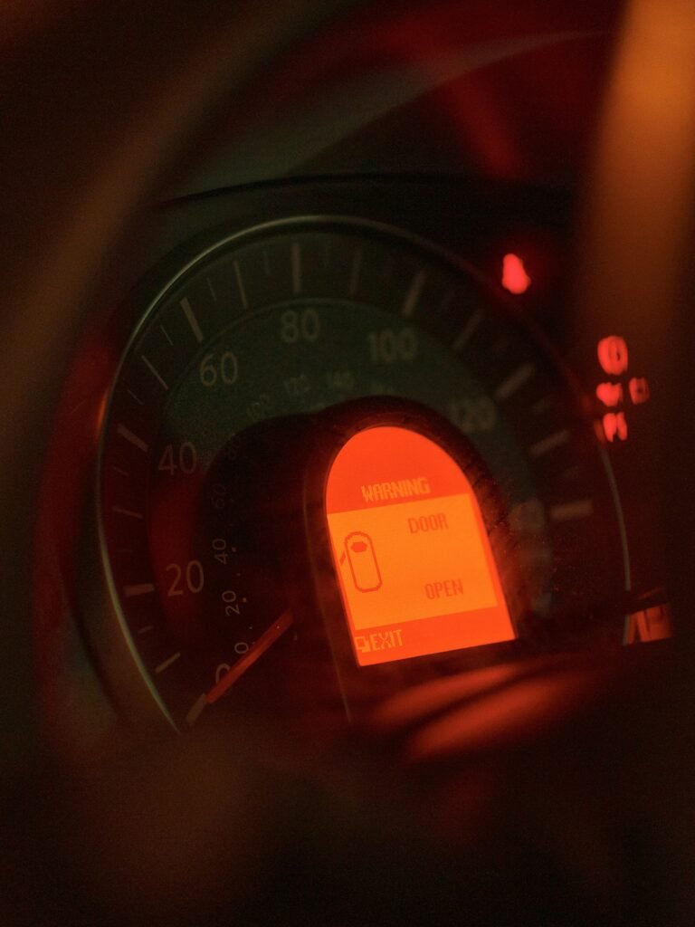 Car dashboard with the check engine light and other warning lights illuminated, Weston FL auto repair