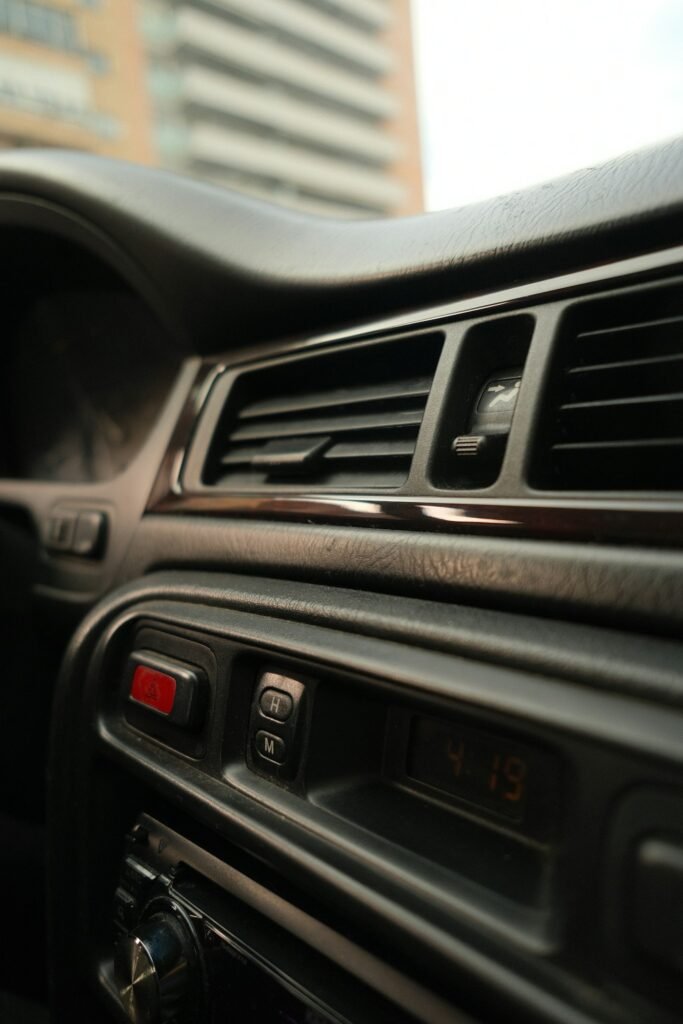 Car interior dashboard air vents before cabin air filter replacement in Cooper City, FL