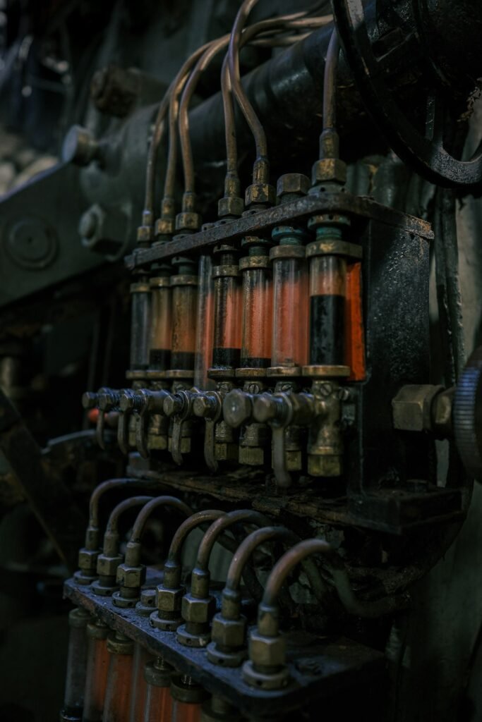 Close-up of an engine fuel injection system and fuel rail during fuel injector cleaning in Davie, FL