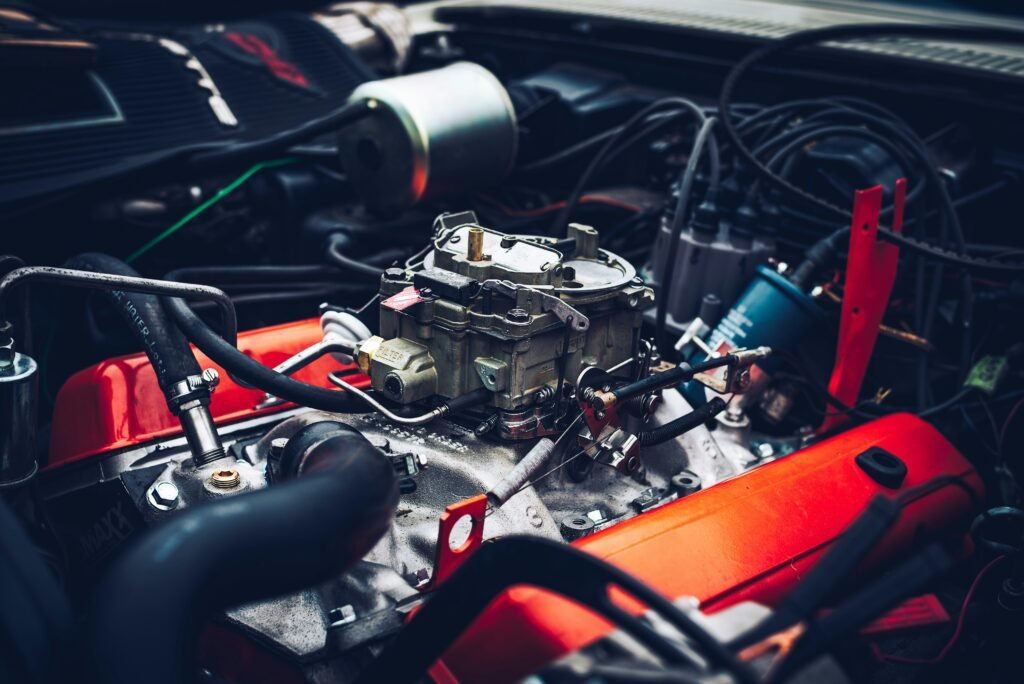 Close-up of a car engine bay where the serpentine belt and pulleys are inspected before belt replacement in Southwest Ranches, FL
