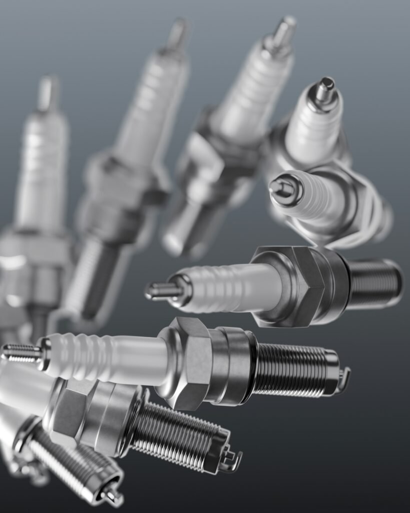 A set of new metallic spark plugs ready for spark plug replacement in Cooper City, FL